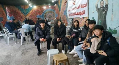 لا علاقة للصورة المتداولة بالوفد المصاب بكورونا الذي زار فلسطين